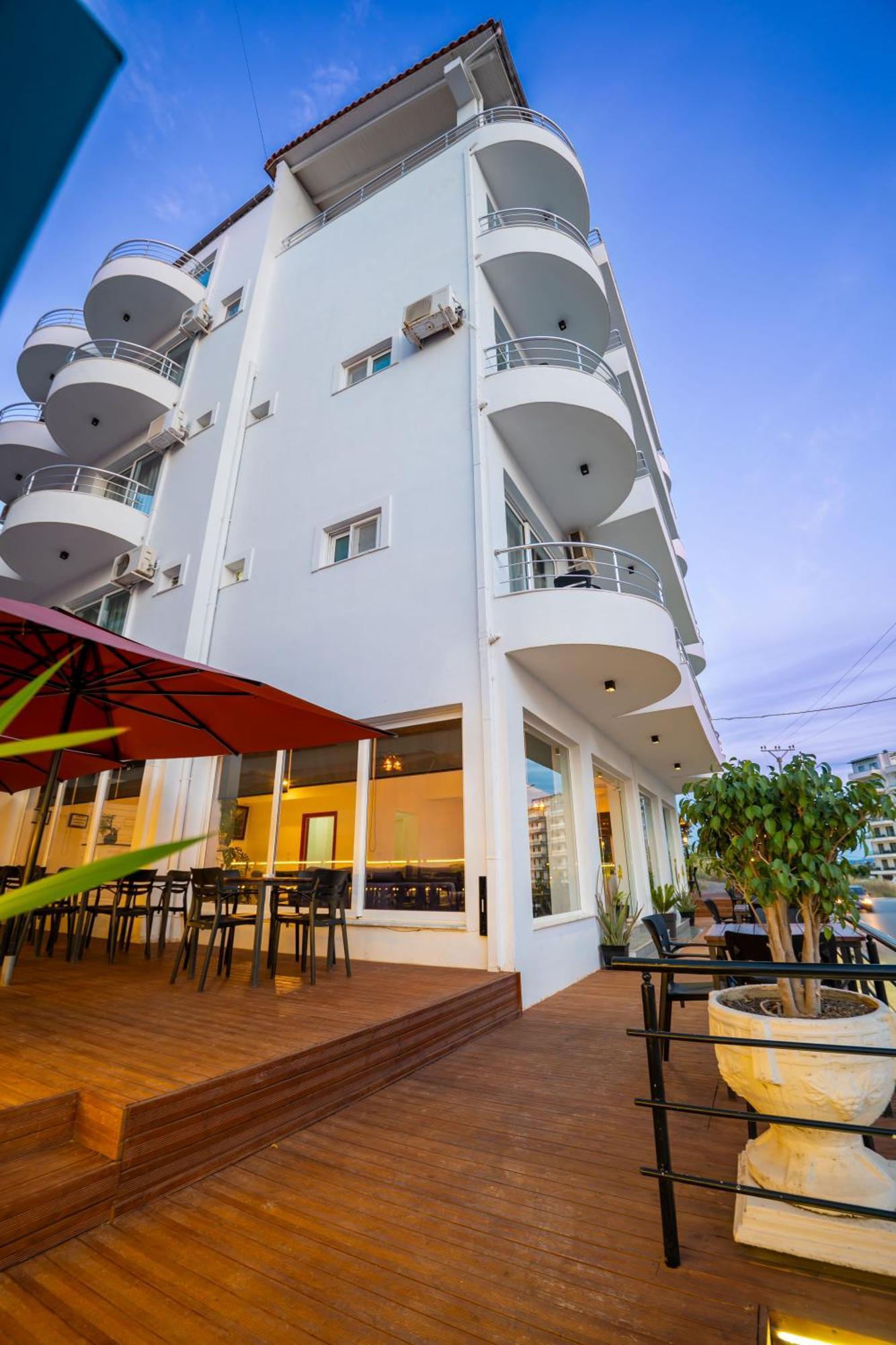 Alnes Hotel Sarande Bagian luar foto